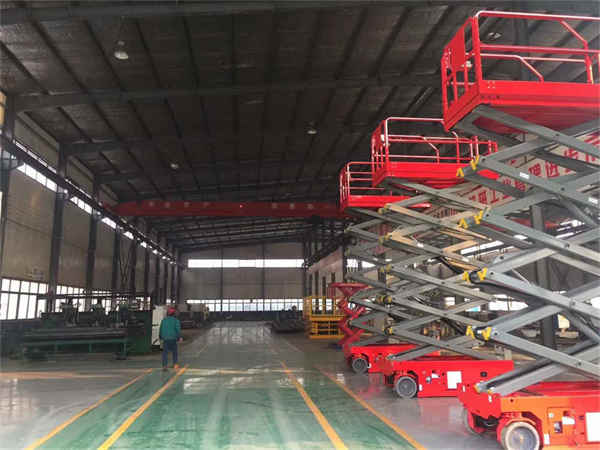 مقصات ذات عجلات من نوع الدفع الآلي ، منصة رفع تعمل بالهواء المضغوط Wheeled Type Auto Propelled Scissors Aerial Working Lifting Platform
